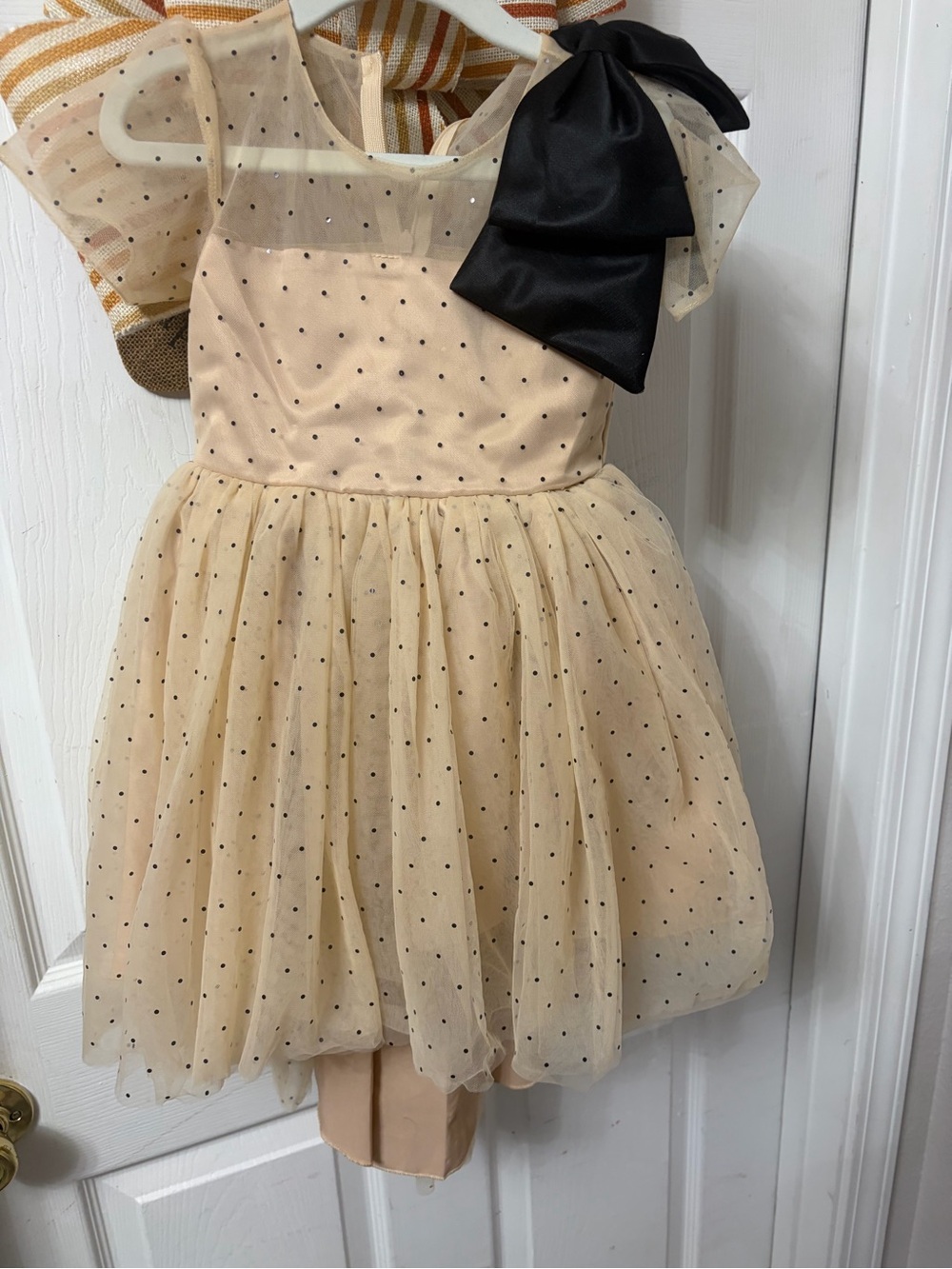 Girls Cream Polka Dot Tulle Party Dress with Black Bow Accent